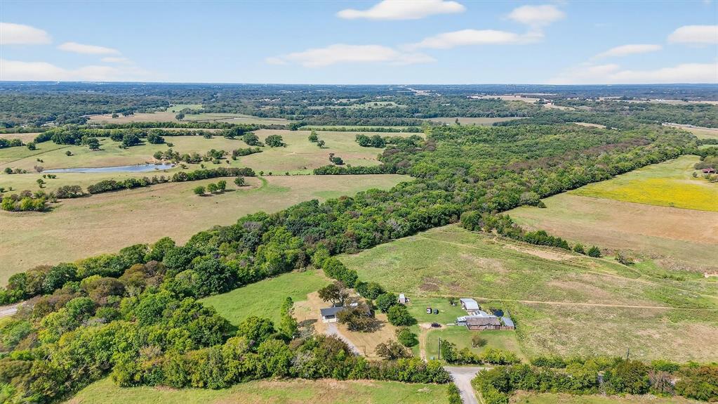 621 Craft Road Bells, TX 75414 - Photo 39 of 40 a view of a city and an ocean view