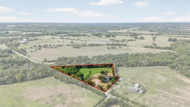 an aerial view of beach and ocean