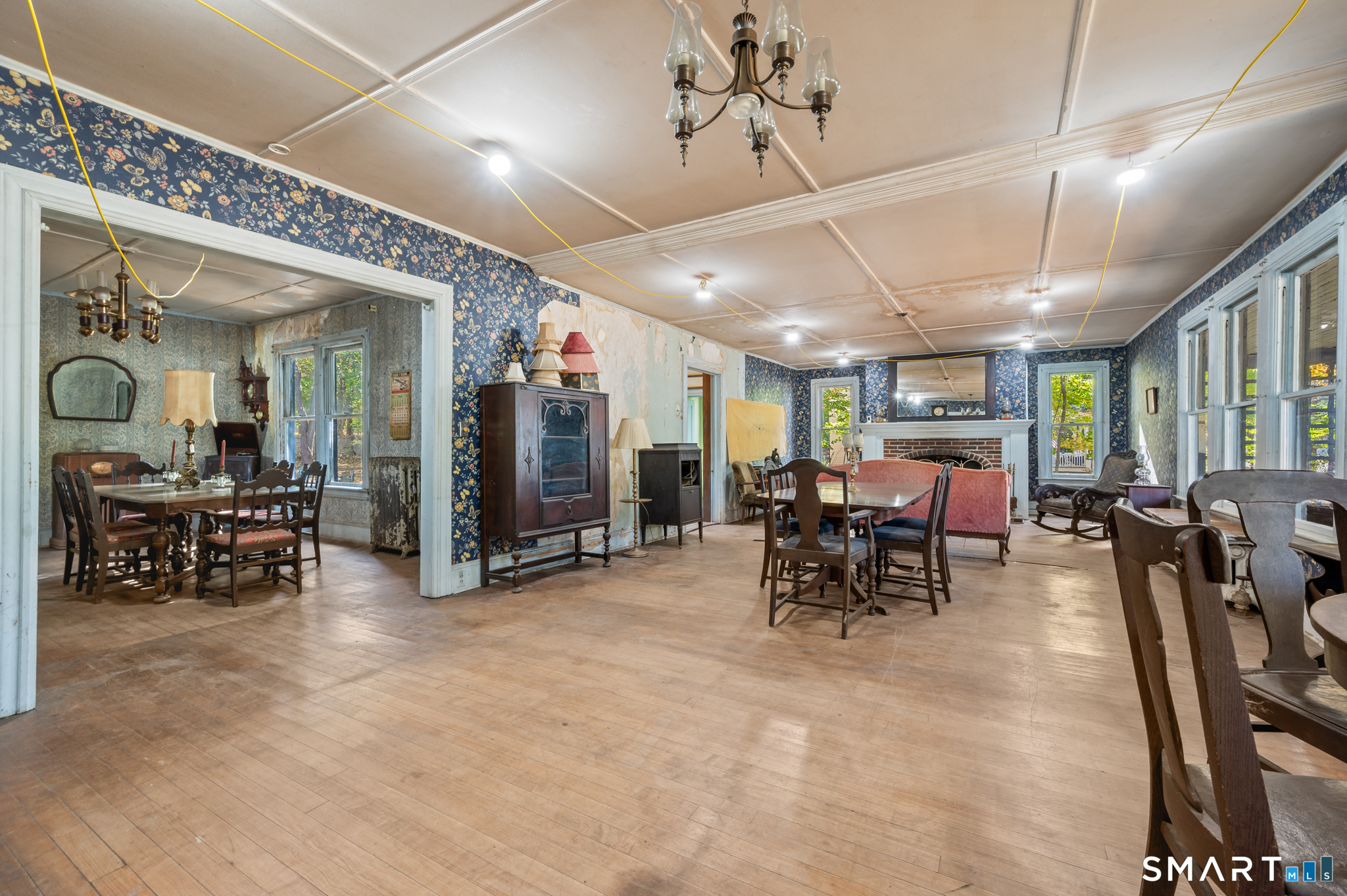 124 River Road Willington, CT 06279 - Photo 7 of 40 a view of a room with furniture and a chandelier