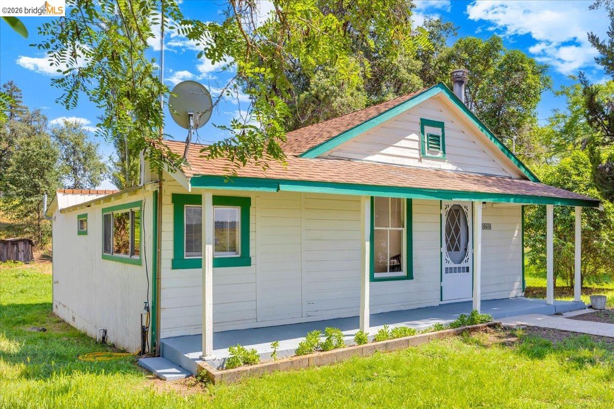 10624 Campo Seco Road Jamestown, CA 95327 - Photo 1 of 46 a view of a house with yard and sitting area