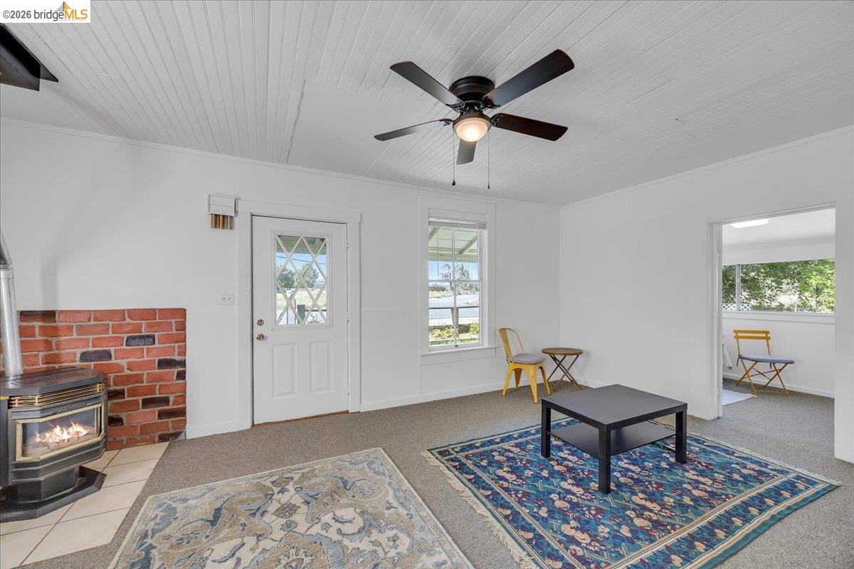 10624 Campo Seco Road Jamestown, CA 95327 - Photo 12 of 46 a living room with furniture and a rug
