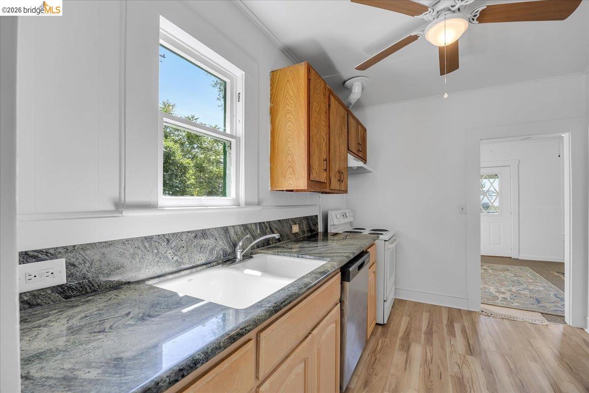 10624 Campo Seco Road Jamestown, CA 95327 - Photo 14 of 46 a kitchen with a sink a counter space and a window