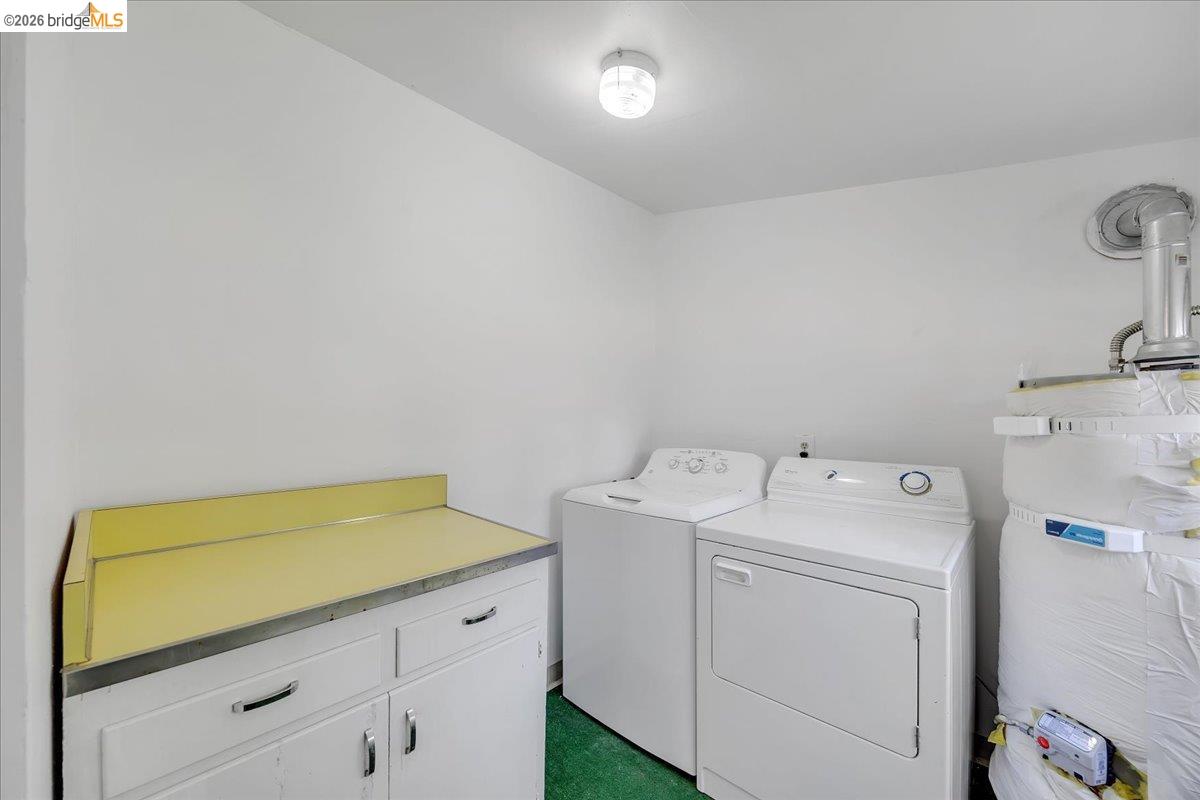 10624 Campo Seco Road Jamestown, CA 95327 - Photo 16 of 46 a utility room with dryer and washer