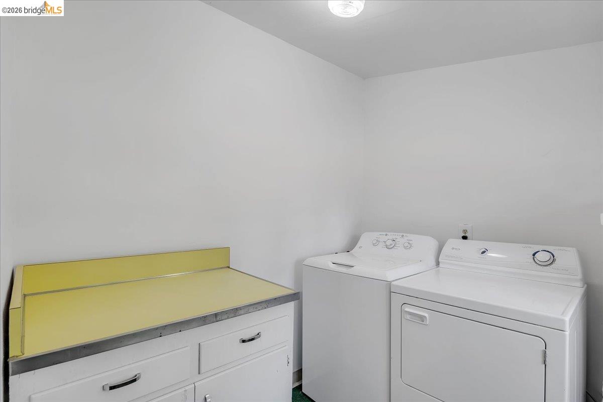 10624 Campo Seco Road Jamestown, CA 95327 - Photo 17 of 46 a utility room with dryer and washer