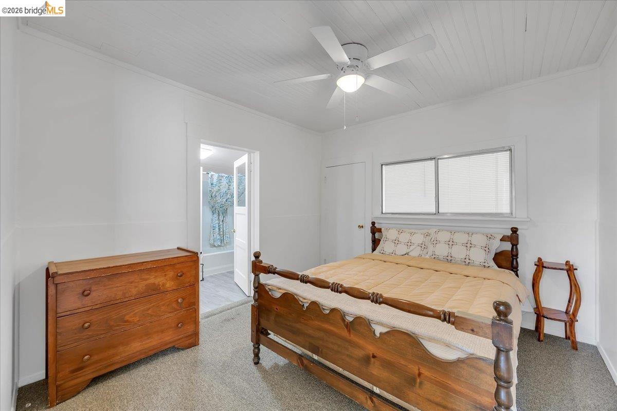 10624 Campo Seco Road Jamestown, CA 95327 - Photo 19 of 46 a bedroom with a bed and a dresser