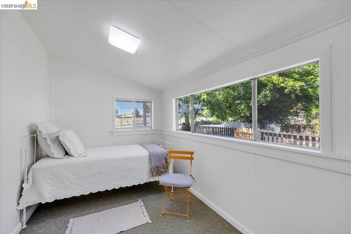 10624 Campo Seco Road Jamestown, CA 95327 - Photo 23 of 46 a bedroom with a bed and a large window