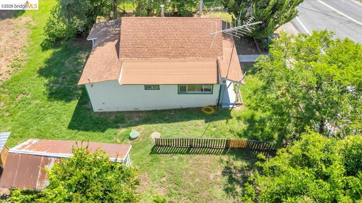 10624 Campo Seco Road Jamestown, CA 95327 - Photo 28 of 46 an aerial view of a house with a yard and a large tree