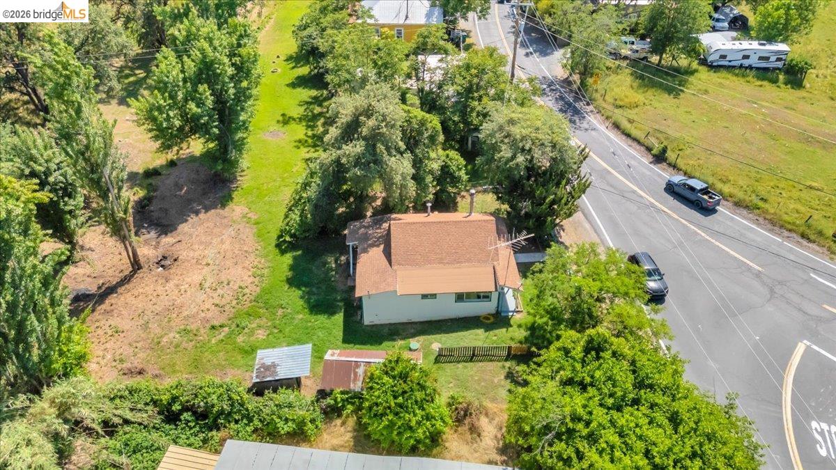 10624 Campo Seco Road Jamestown, CA 95327 - Photo 29 of 46 an aerial view of a house with a garden and trees all around