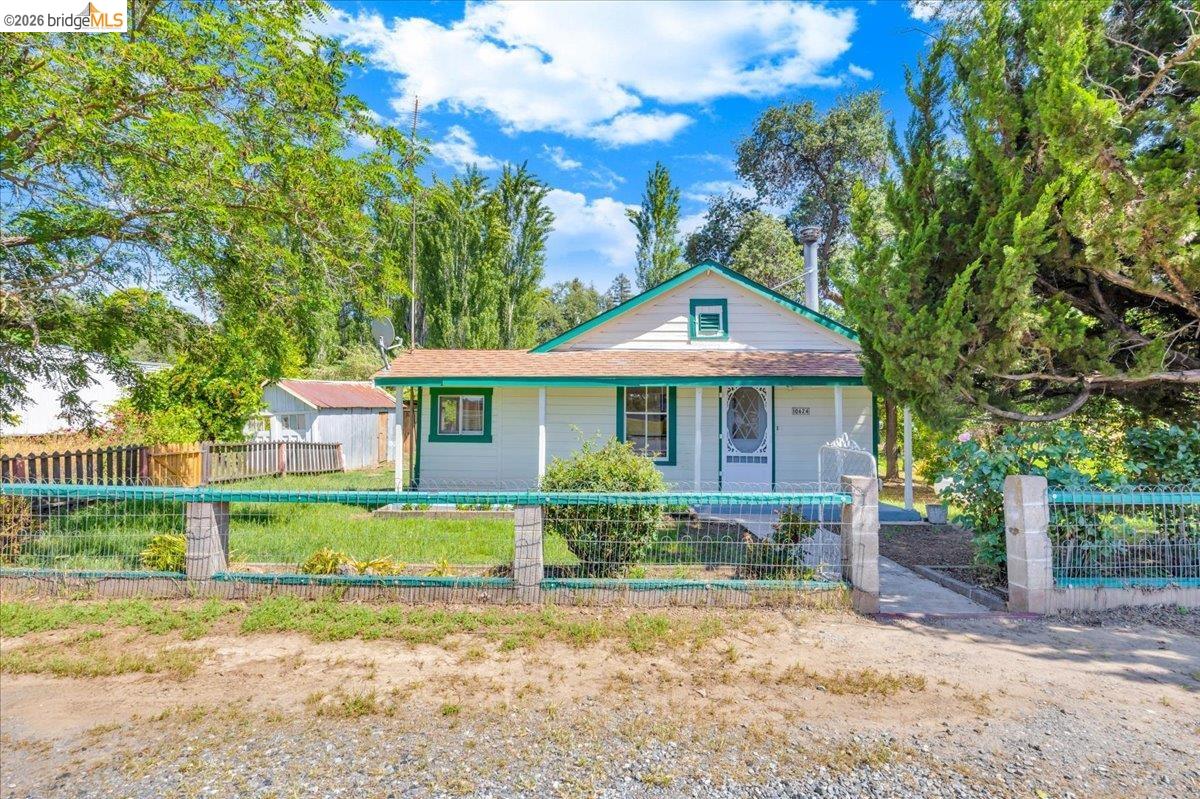 10624 Campo Seco Road Jamestown, CA 95327 - Photo 3 of 46 a front view of a house with a yard