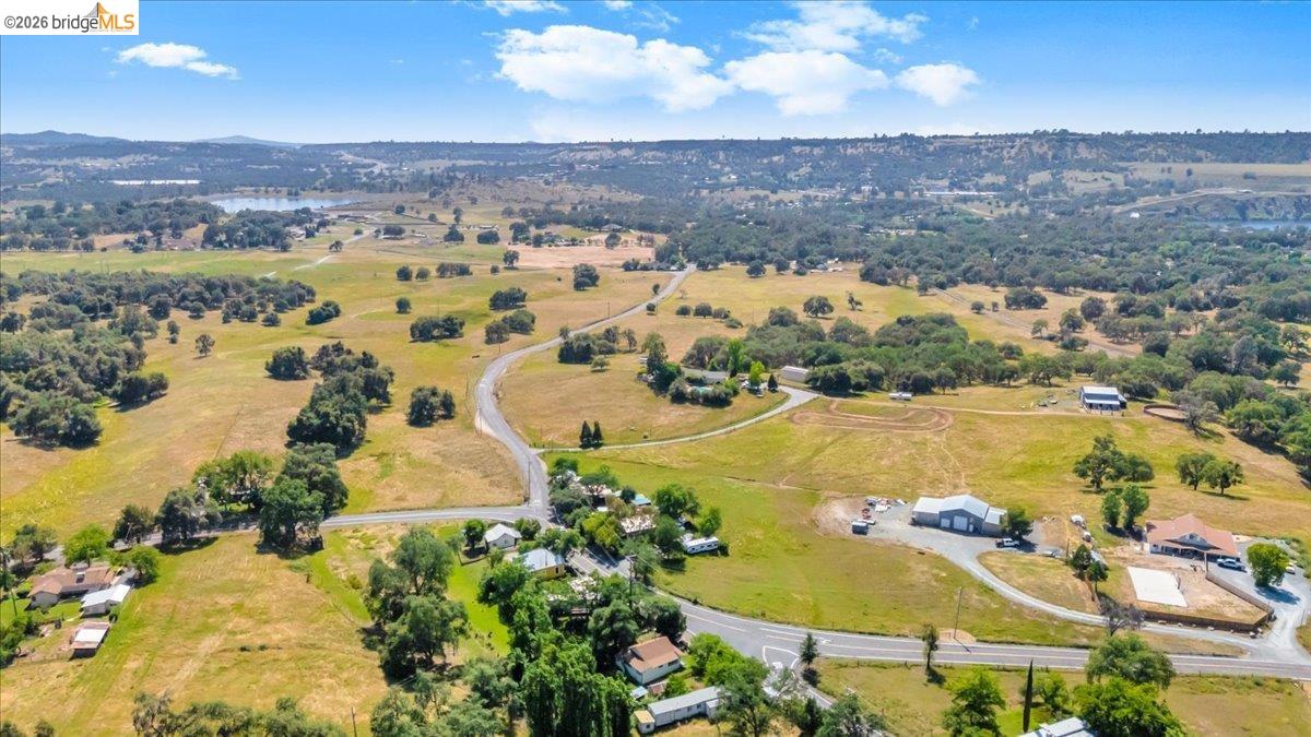 10624 Campo Seco Road Jamestown, CA 95327 - Photo 36 of 46 an aerial view of residential building and lake view