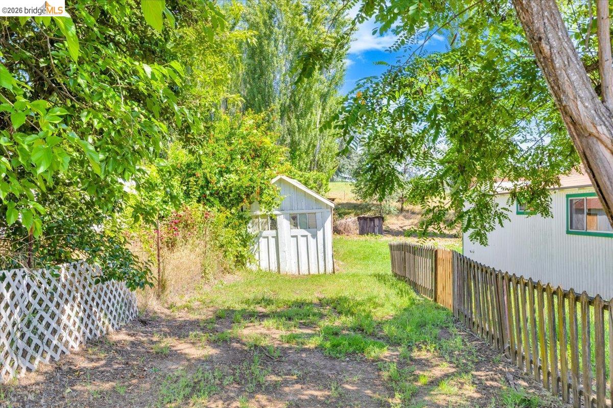 10624 Campo Seco Road Jamestown, CA 95327 - Photo 38 of 46 a view of a house with a yard