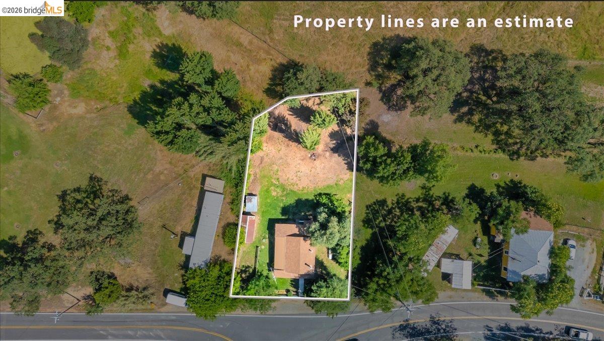 10624 Campo Seco Road Jamestown, CA 95327 - Photo 46 of 46 an aerial view of a house with a yard and garden