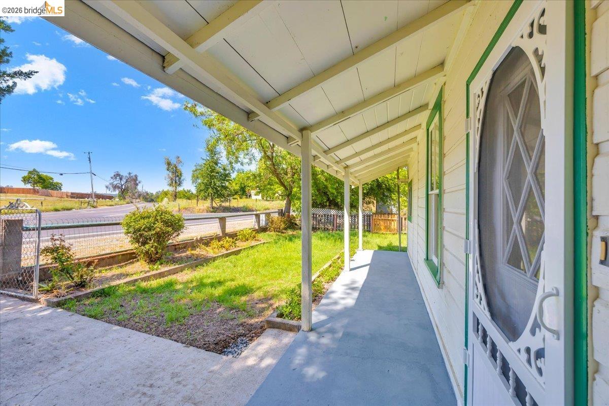 10624 Campo Seco Road Jamestown, CA 95327 - Photo 7 of 46 a view of a swimming pool with an outdoor seating