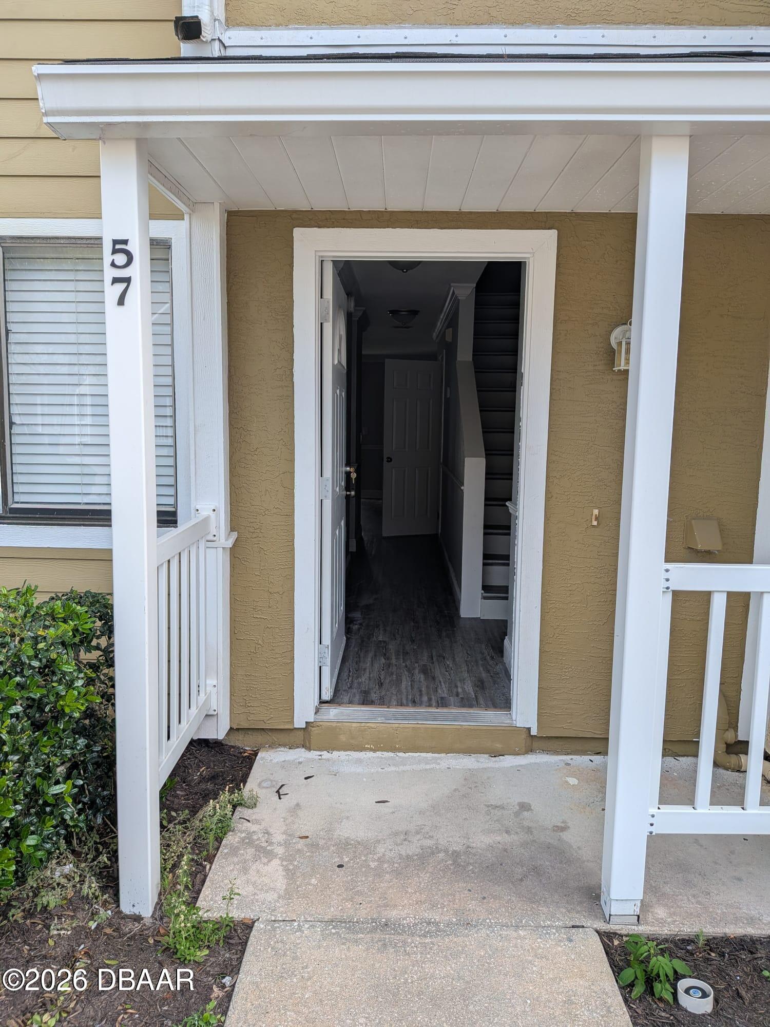480 Reed Canal Road, Unit 57 South Daytona, FL 32119 - Photo 1 of 10 a view of a entryway door of the house