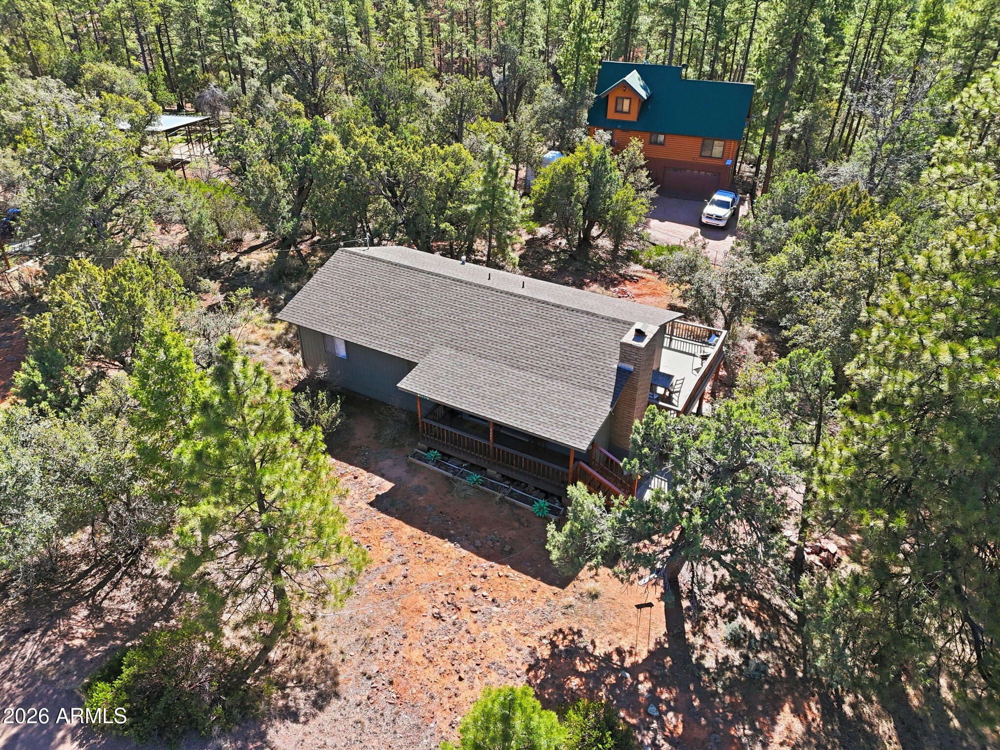 8247 Ralls Drive Pine, AZ 85544 - Photo 33 of 50 view of a house with a yard and sitting area