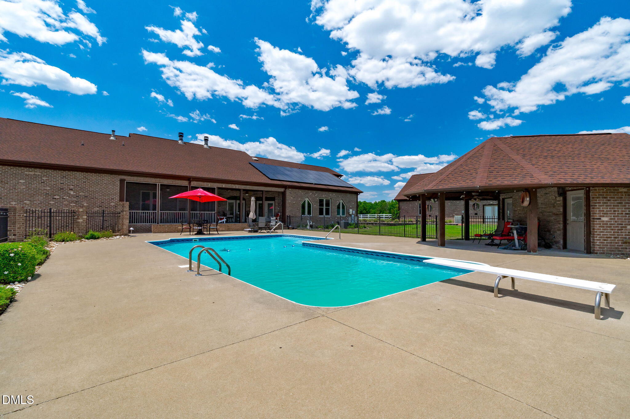 10917 Jordan Road Raleigh, NC 27603 - Photo 44 of 58 a view of house with outdoor space and swimming pool