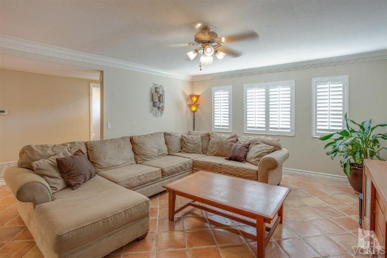 2283 Ralston Street Simi Valley, CA 93063 - Photo 3 of 37 a living room with furniture and a chandelier