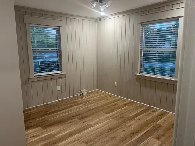 a view of a room that has a window in it