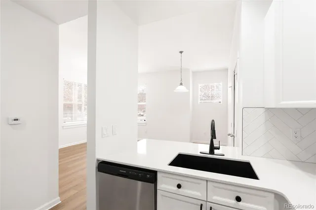 a close up of a sink and a mirror