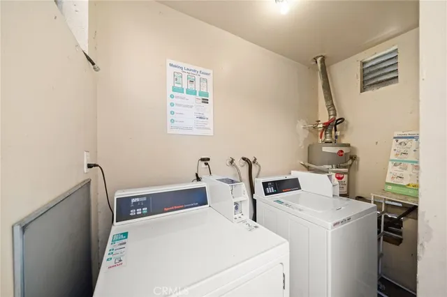 a view of room with washer and dryer