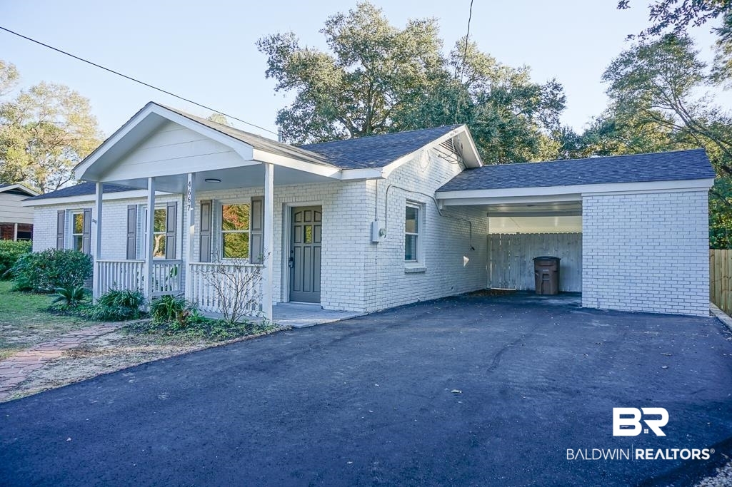 4667 Cottonwood Drive Mobile, AL 36608 - Photo 21 of 21 Single story home featuring a carport and a porch