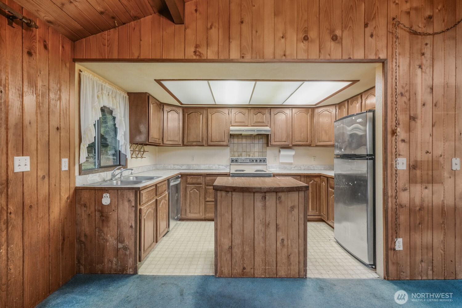 8388 North Pass Road Everson, WA 98247 - Photo 14 of 33 a kitchen with stainless steel appliances granite countertop a sink and cabinets