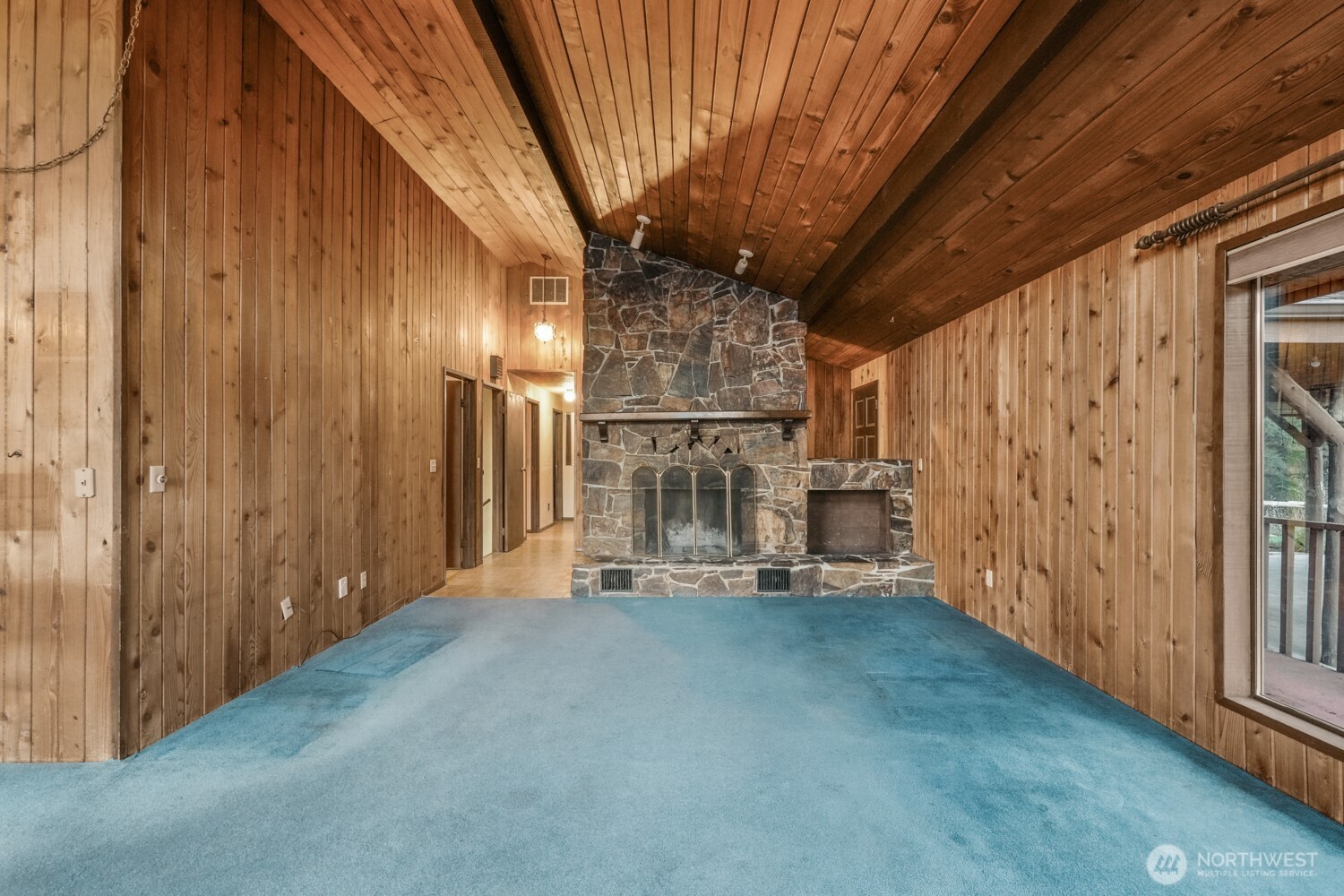 8388 North Pass Road Everson, WA 98247 - Photo 4 of 33 a view of a hallway with wooden walls