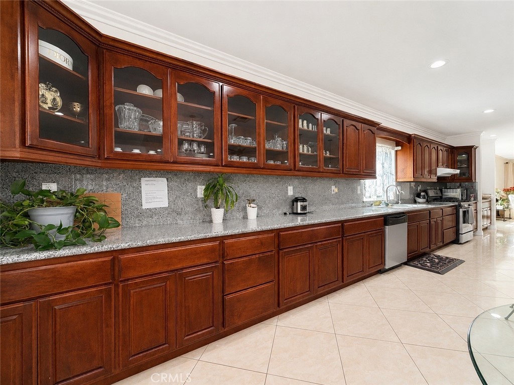 18437 Newman Avenue Riverside, CA 92508 - Photo 13 of 51 Extensive bank of cabinetry in this kitchen for all your storage needs