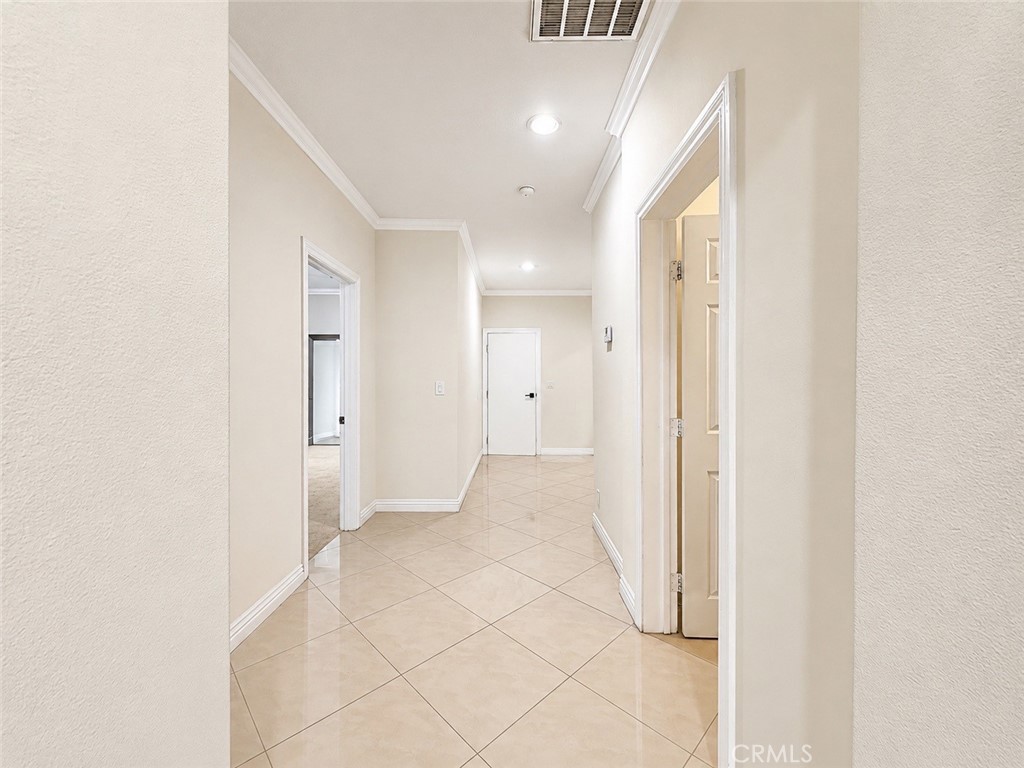 18437 Newman Avenue Riverside, CA 92508 - Photo 18 of 51 Hallway from dining/living room to bedrooms