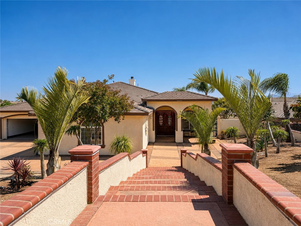 18437 Newman Avenue Riverside, CA 92508 - Photo 2 of 51 Stone and brickwork staircase from the street. Driveway (not pictured descends from street for at grade level entrance to home)
