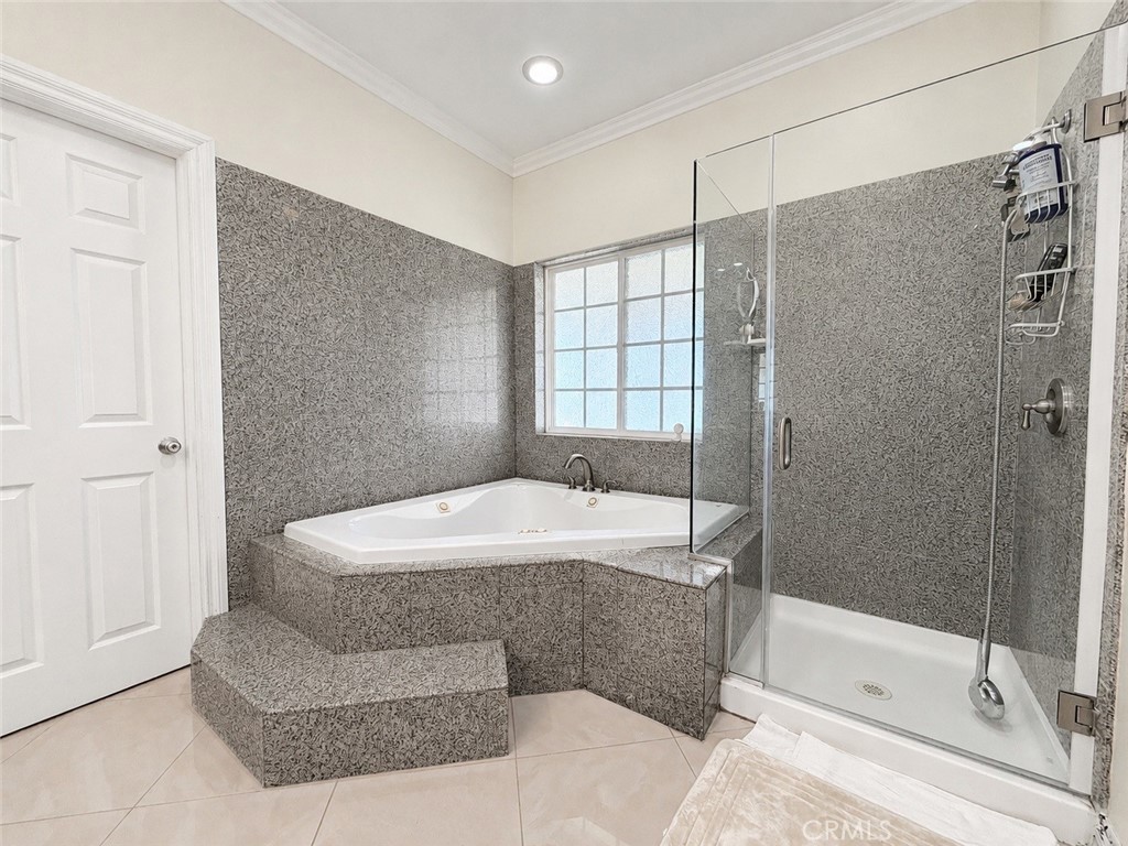 18437 Newman Avenue Riverside, CA 92508 - Photo 21 of 51 Primary ensuite bathroom with jetted tub, shower and entrance to walk-in closet (#2)