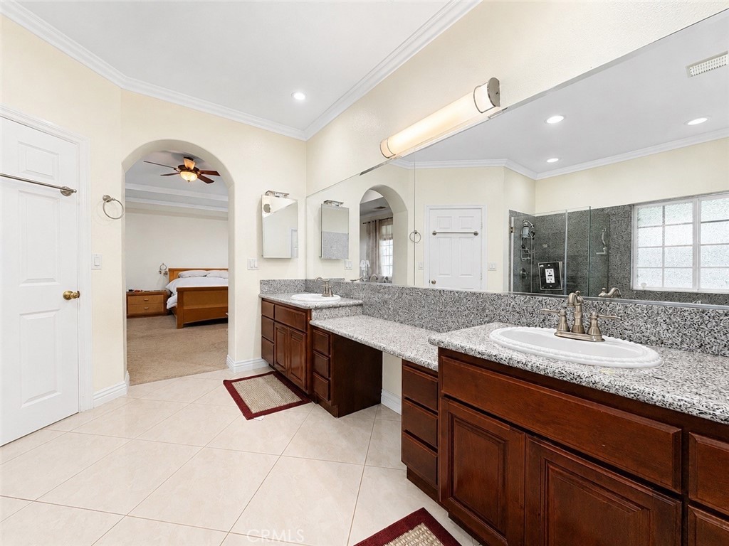 18437 Newman Avenue Riverside, CA 92508 - Photo 22 of 51 Primary ensuite bath with double sinks and prep vanity