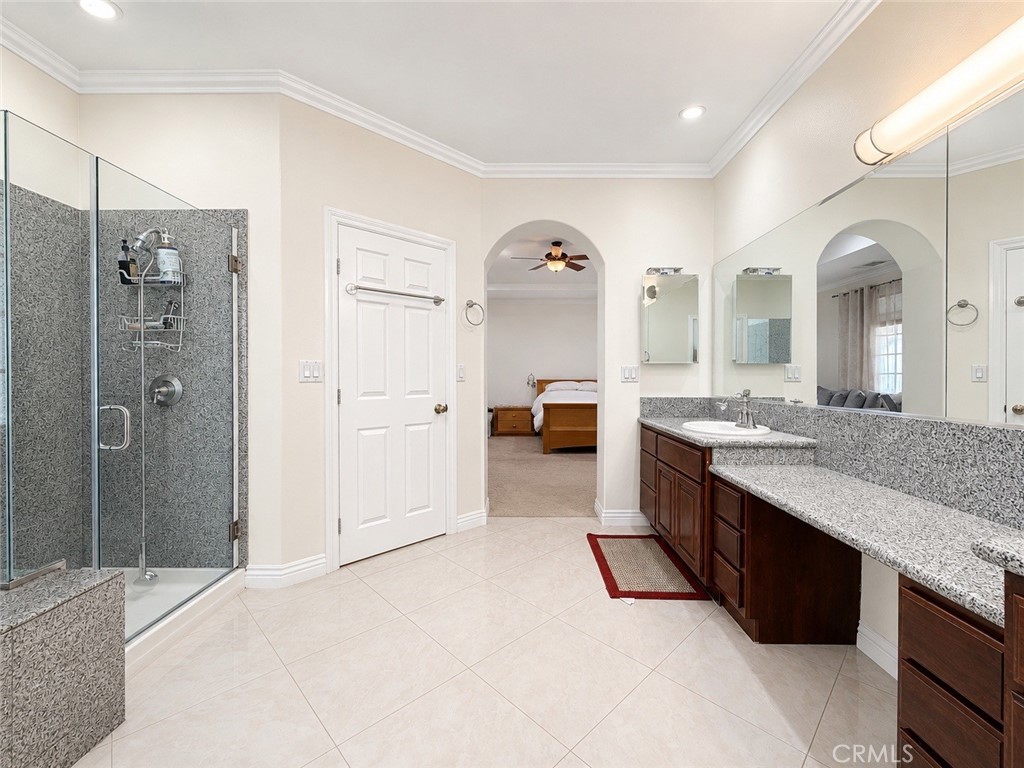 18437 Newman Avenue Riverside, CA 92508 - Photo 23 of 51 Primary ensuite bath with view of shower and door to toilet