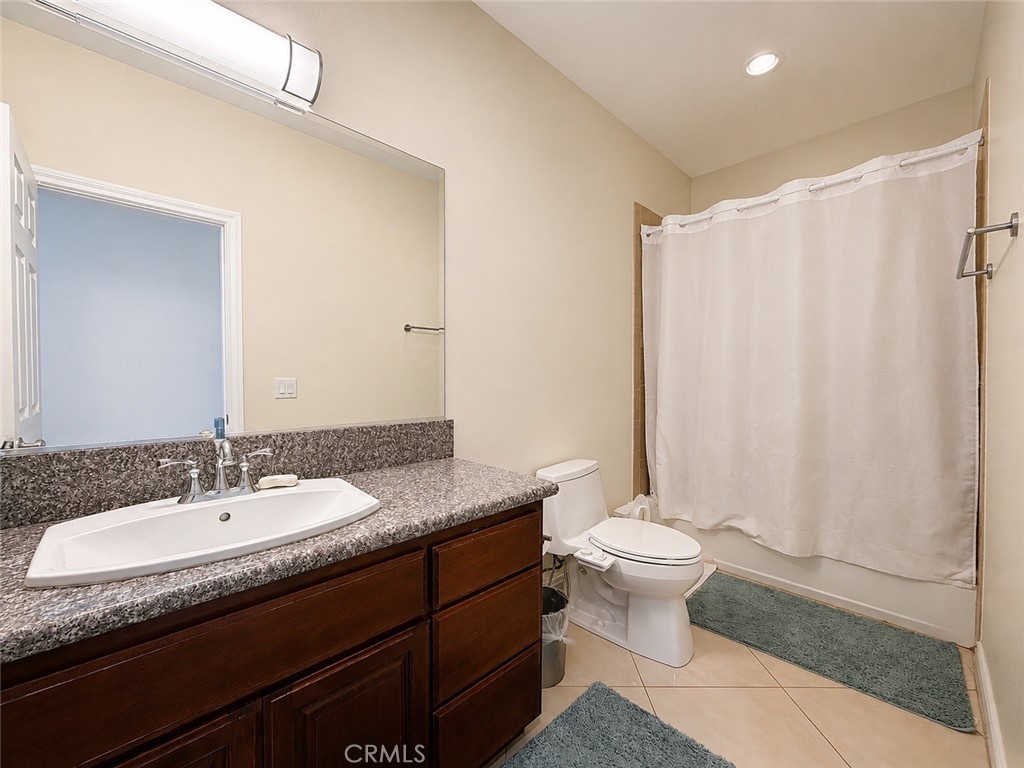 18437 Newman Avenue Riverside, CA 92508 - Photo 28 of 51 Additional main bathroom with single sink, tub, shower