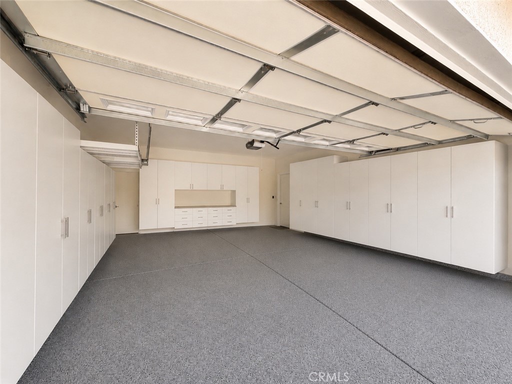 18437 Newman Avenue Riverside, CA 92508 - Photo 34 of 51 One (of two) double car garages. Other garage is currently used as gym and office
