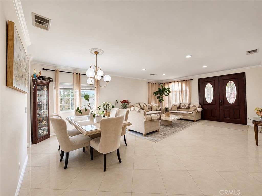 18437 Newman Avenue Riverside, CA 92508 - Photo 6 of 51 Gracious living at its finest. Double doors at the entrance with stained glass accents