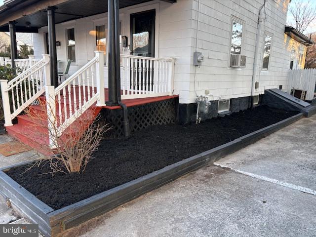 116 Ellis Street Glassboro, NJ 08028 - Photo 2 of 10 a view of a porch with wooden floor and bench