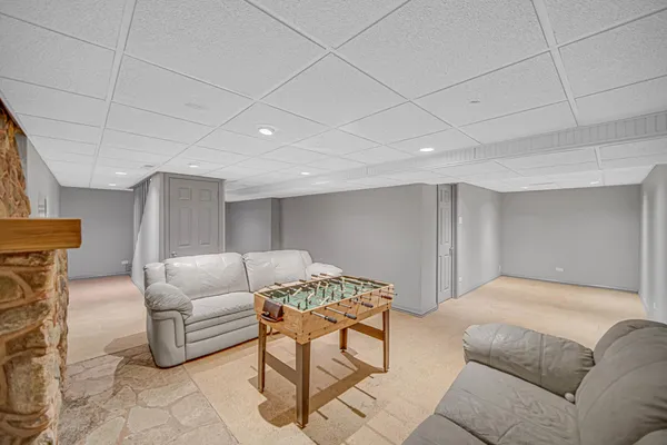 a living room with furniture and a couch