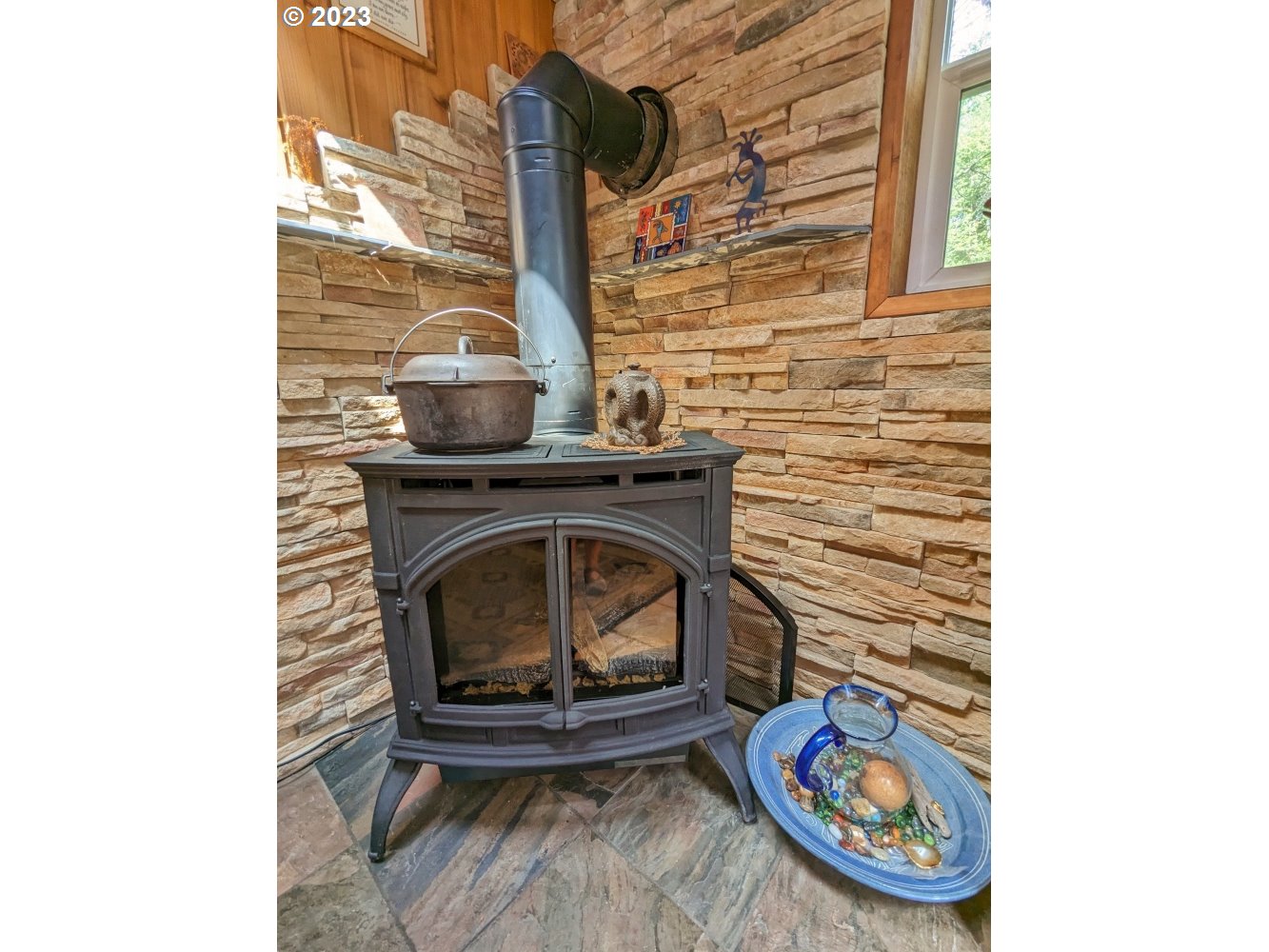 72769 Snowdon Road Rhododendron, OR 97049 - Photo 16 of 48 a stove top oven sitting inside of a kitchen