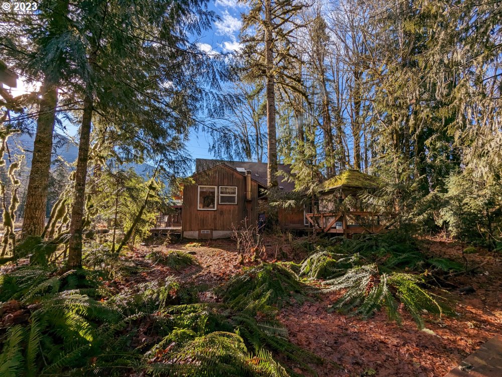 72769 Snowdon Road Rhododendron, OR 97049 - Photo 42 of 48 a backyard of a house with a yard and outdoor seating