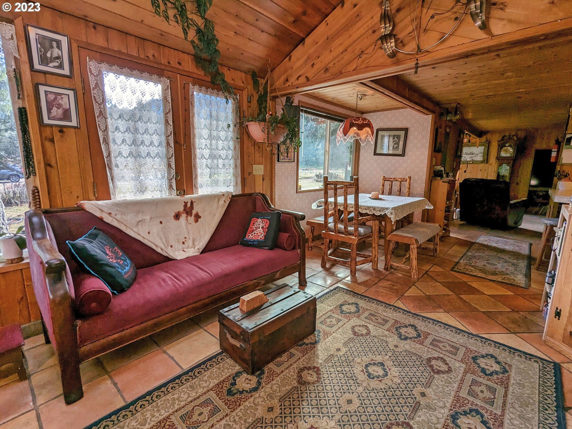 72769 Snowdon Road Rhododendron, OR 97049 - Photo 10 of 48 a living room with furniture a large window with rug