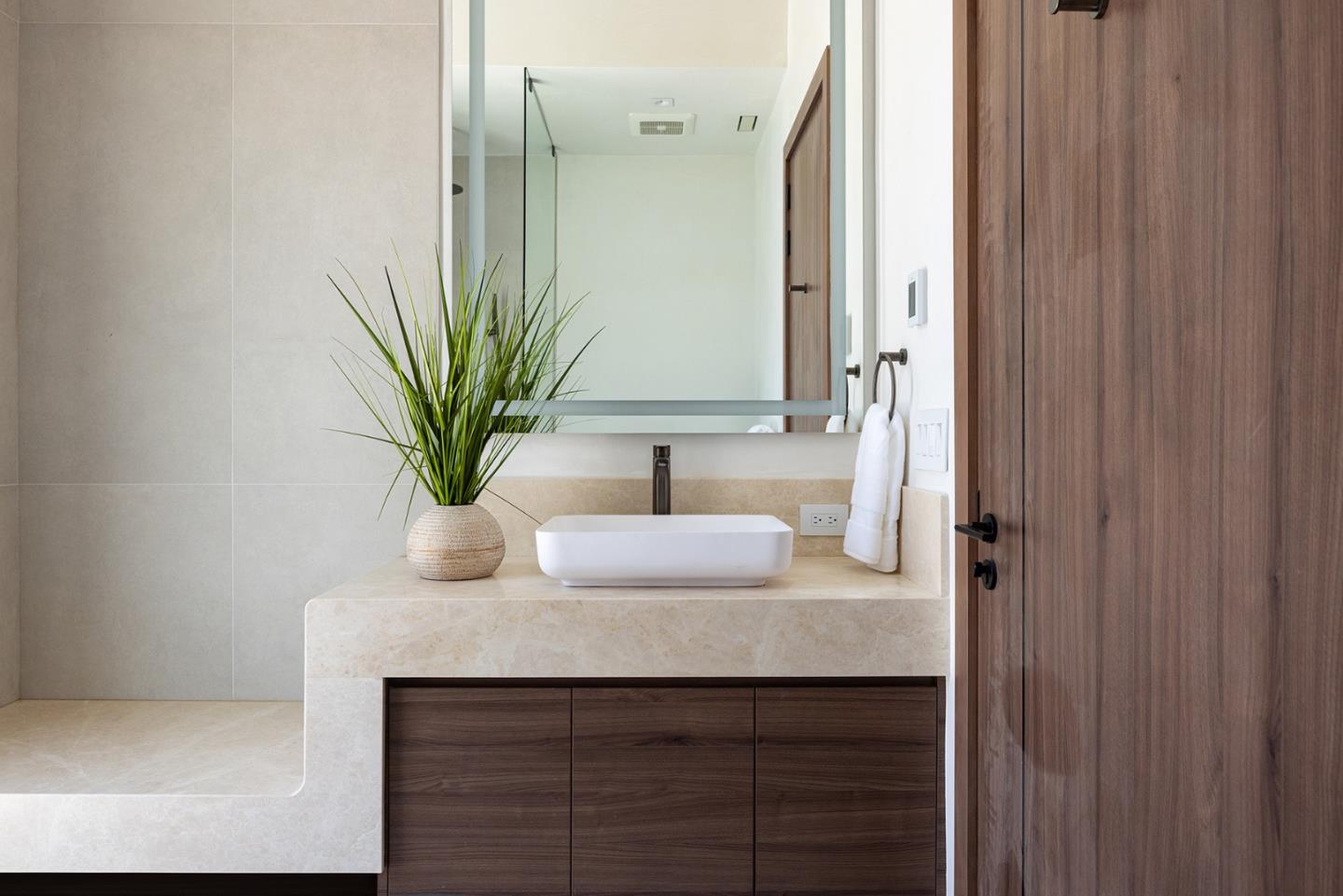 31 Poppy Lane Pebble Beach, CA 93953 - Photo 32 of 45 a bathroom with a sink a vanity and a mirror