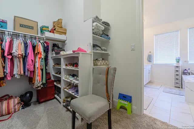 a bathroom with a sink toilet a mirror and shower