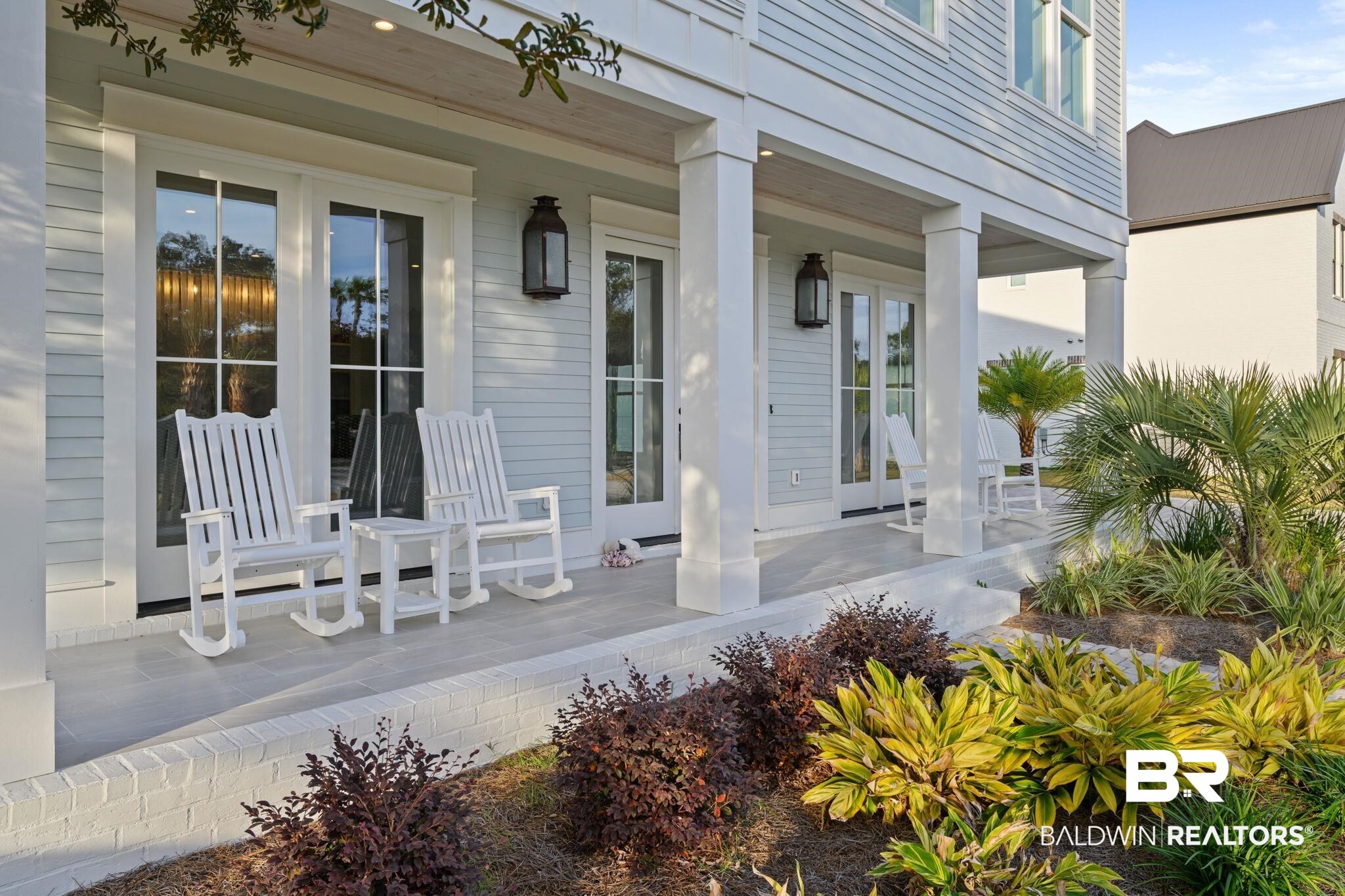 30313 River Road Orange Beach, AL 36561 - Photo 6 of 50 Covered porch featuring french doors