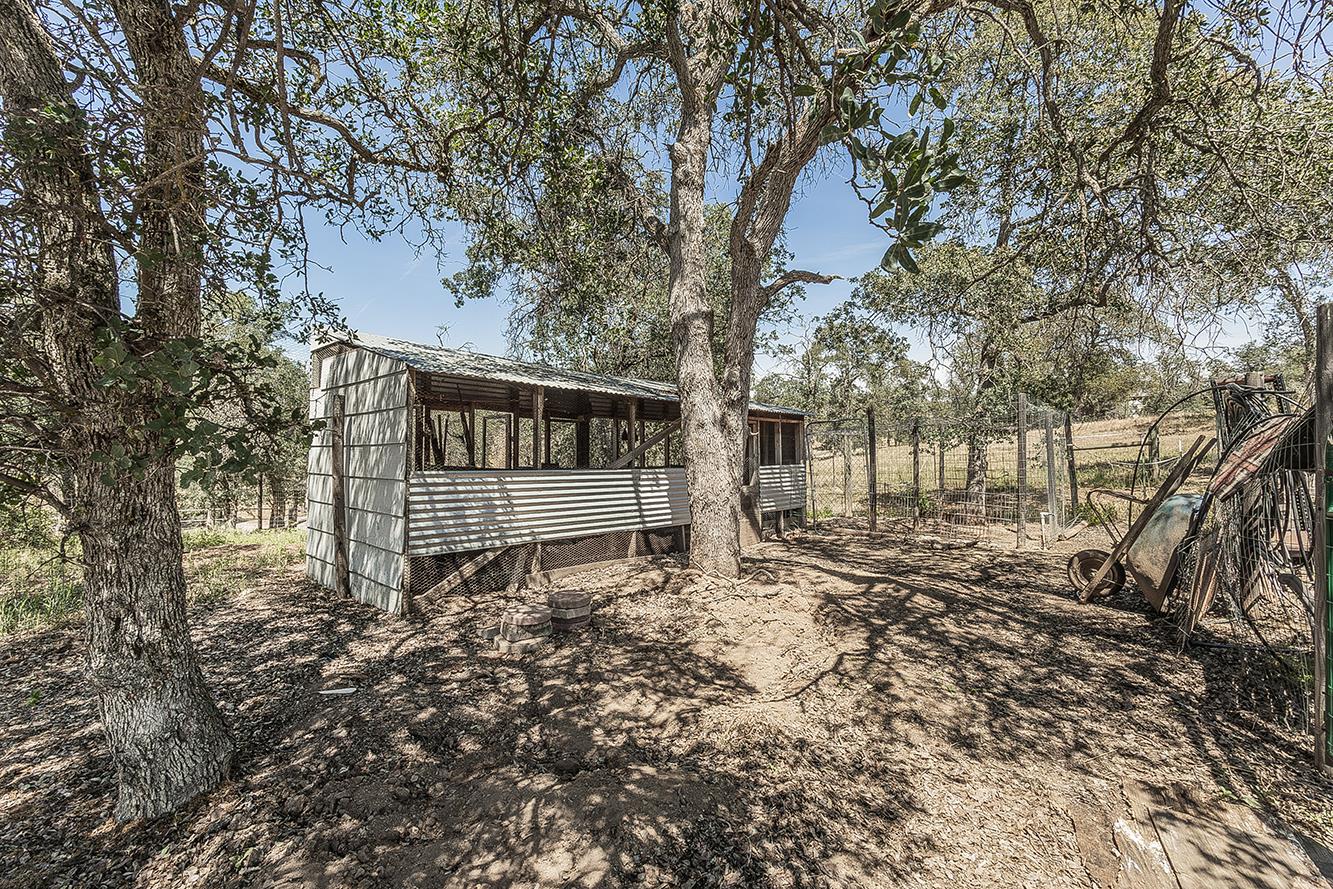 14815 Garlock Lane Prather, CA 93651 - Photo 42 of 80 a view of house with backyard and trees