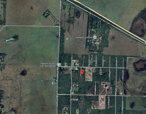 a view of a street with a building in the background