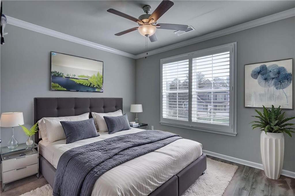 325 Tarpley Way Covington, GA 30016 - Photo 29 of 62 a bedroom with bed and a window