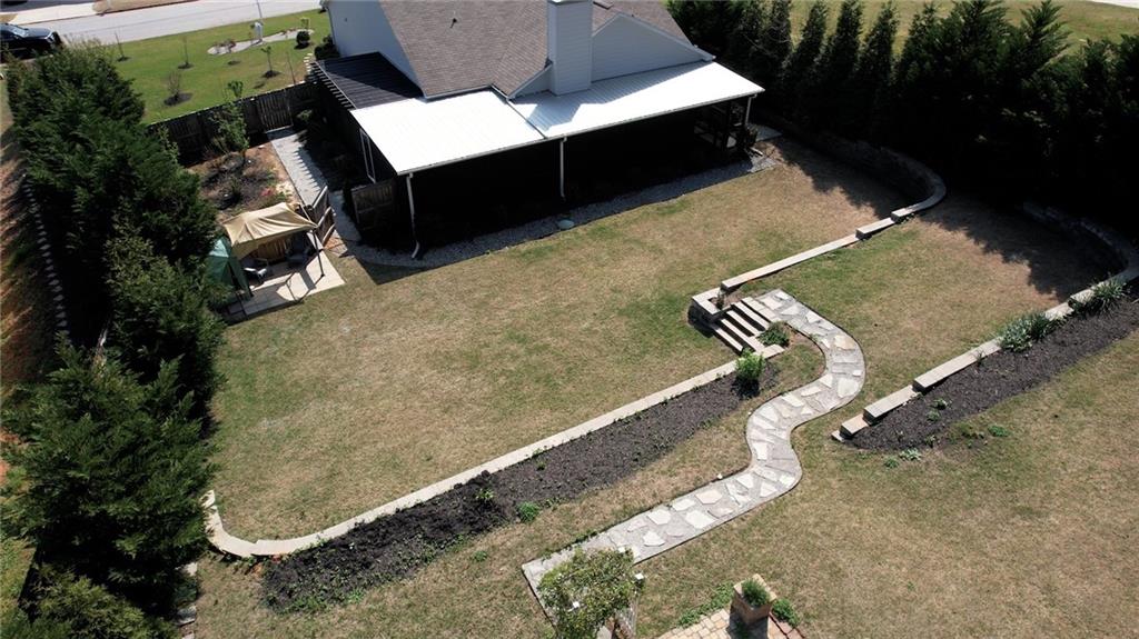 325 Tarpley Way Covington, GA 30016 - Photo 46 of 62 an aerial view of a house with a yard