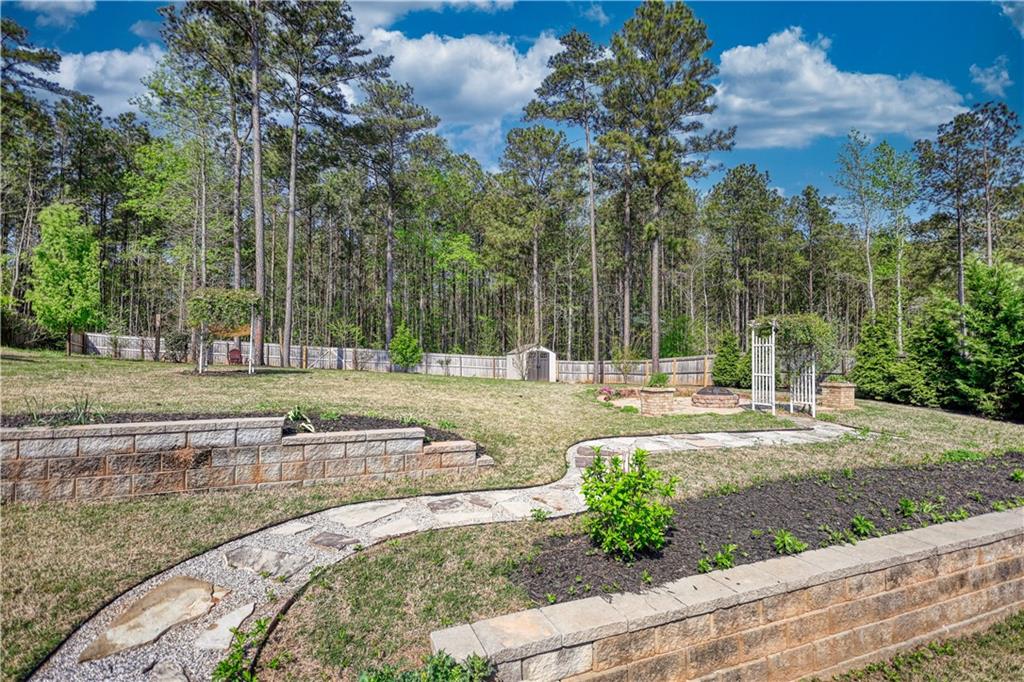 325 Tarpley Way Covington, GA 30016 - Photo 48 of 62 a view of a park with large trees