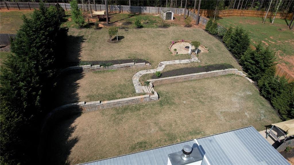 325 Tarpley Way Covington, GA 30016 - Photo 56 of 62 an aerial view of residential houses with outdoor space
